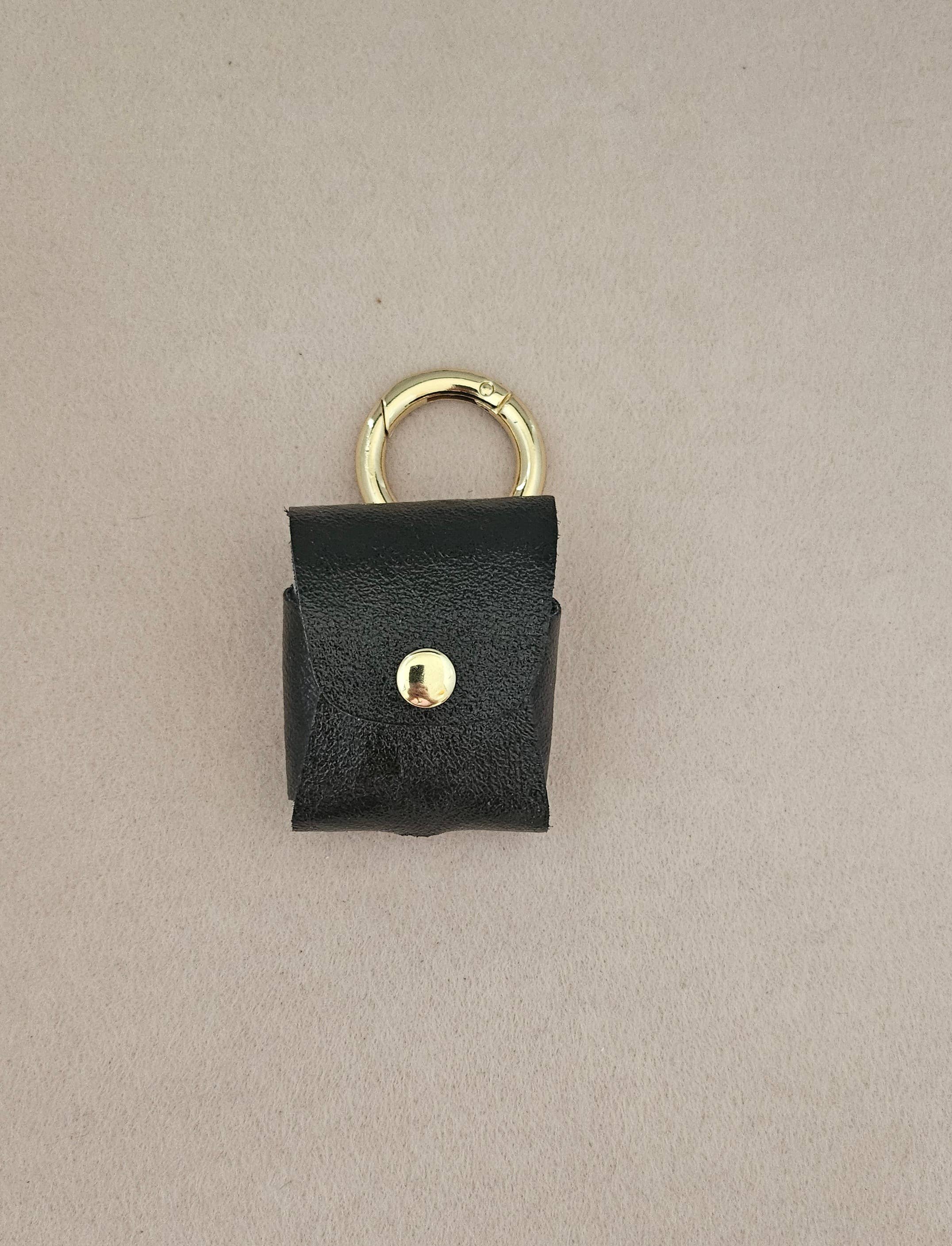 Leder-Kopfhörerhalter, Taschenanhänger: Mit Schnur / Nackt