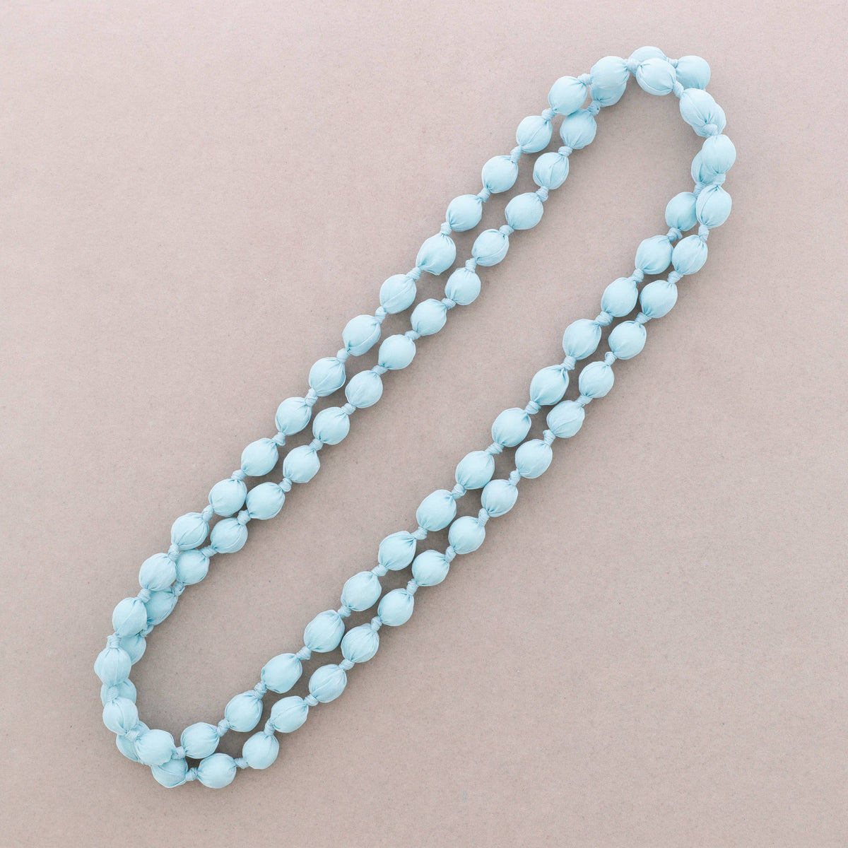 Lange Halskette mit stoffbezogenen Kugeln 160cm (B): Fuchsie