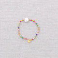 Elastisches Armband aus Stahl mit Perlenanhänger: Multicolor